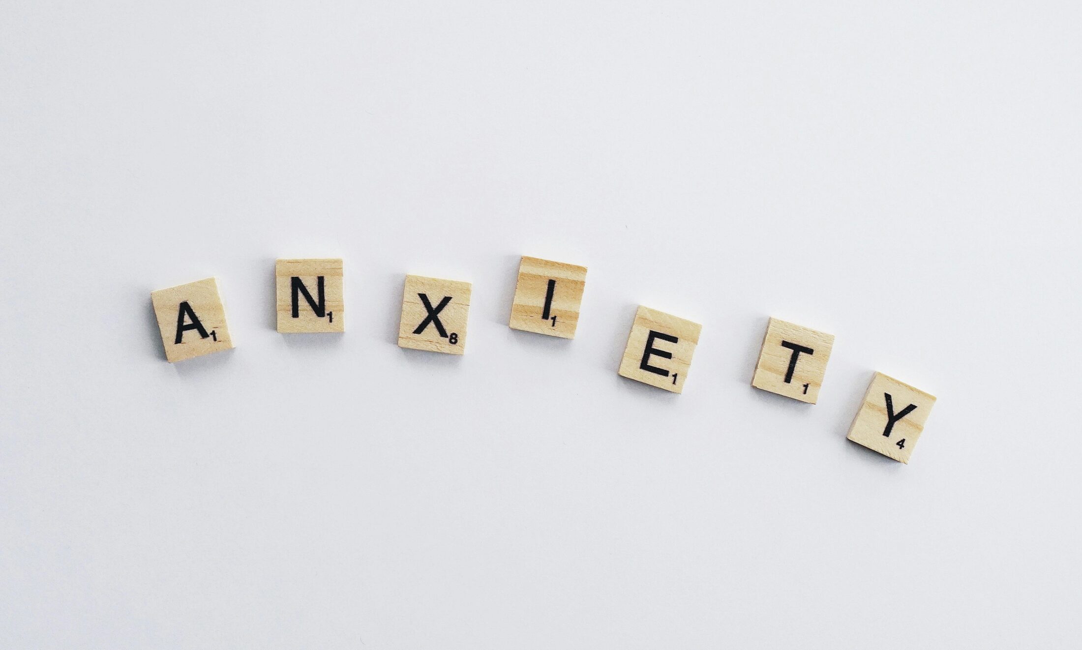 scrabble tiles spell anxiety sativa